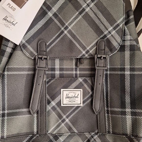 Herschel retreat mini backpack and zip around wallet.  Brand new!